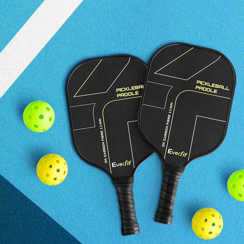 Two pickleball paddles with 'Everfit' branding on a blue background with yellow pickleballs
